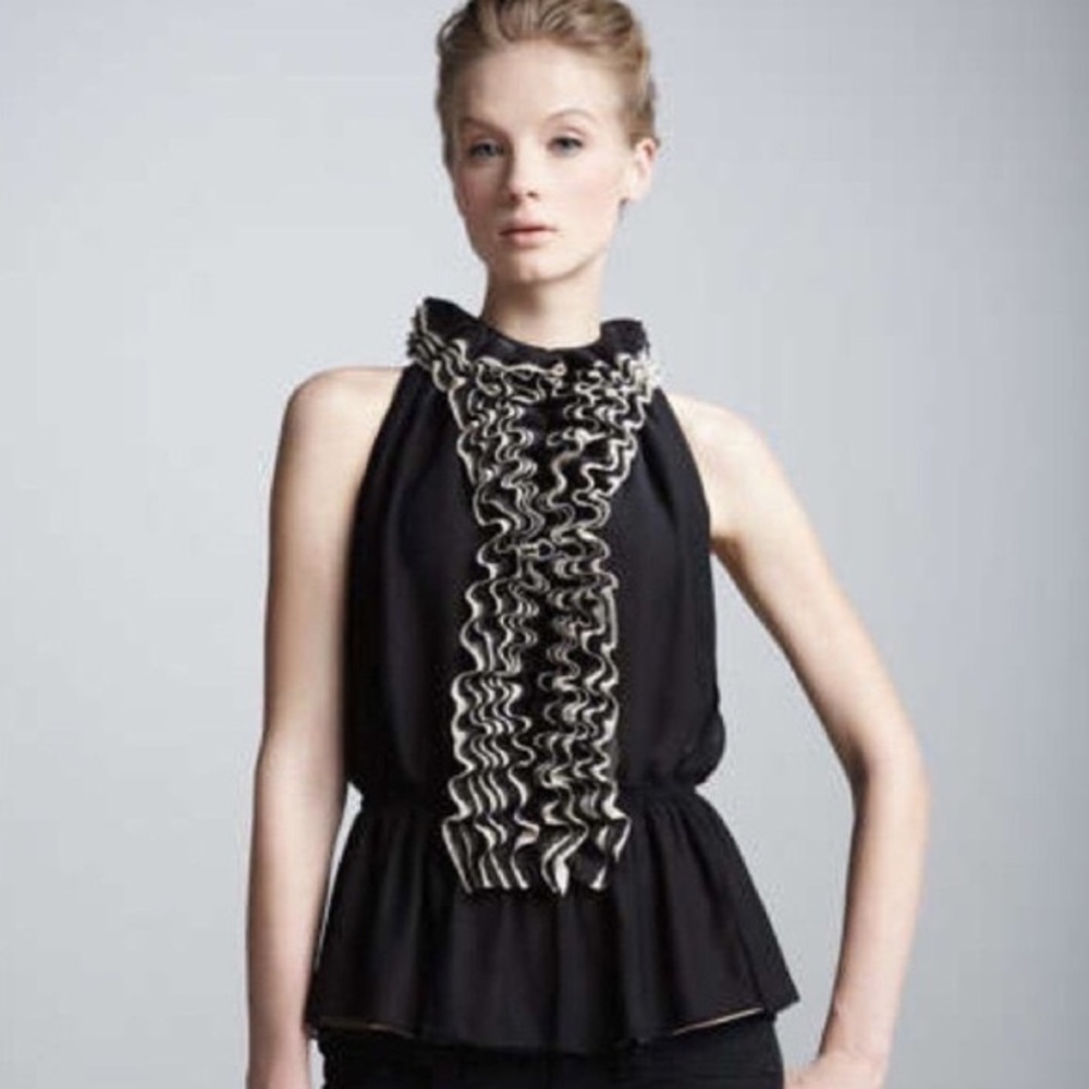 $80 retail. Women's ruffle top new with tags